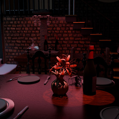 Dimly lit dining table with a small vase of red flowers, a wine bottle, and place settings against a brick wall and staircase in the background.
