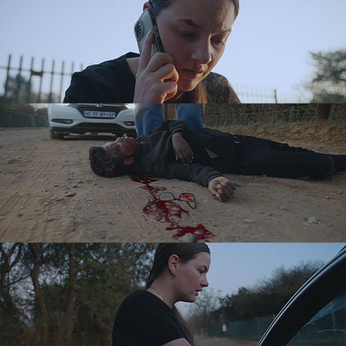 A distressed woman on her cell phone stands near a car as a man lies injured in a bloodstained road, with broken glasses nearby, suggesting a serious accident or crime scene.