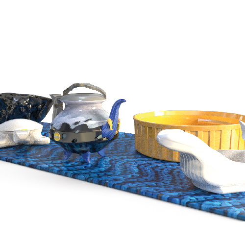 Glass teapot with blue handle on a blue patterned rug, beside a yellow wooden tub and a white slipper.
