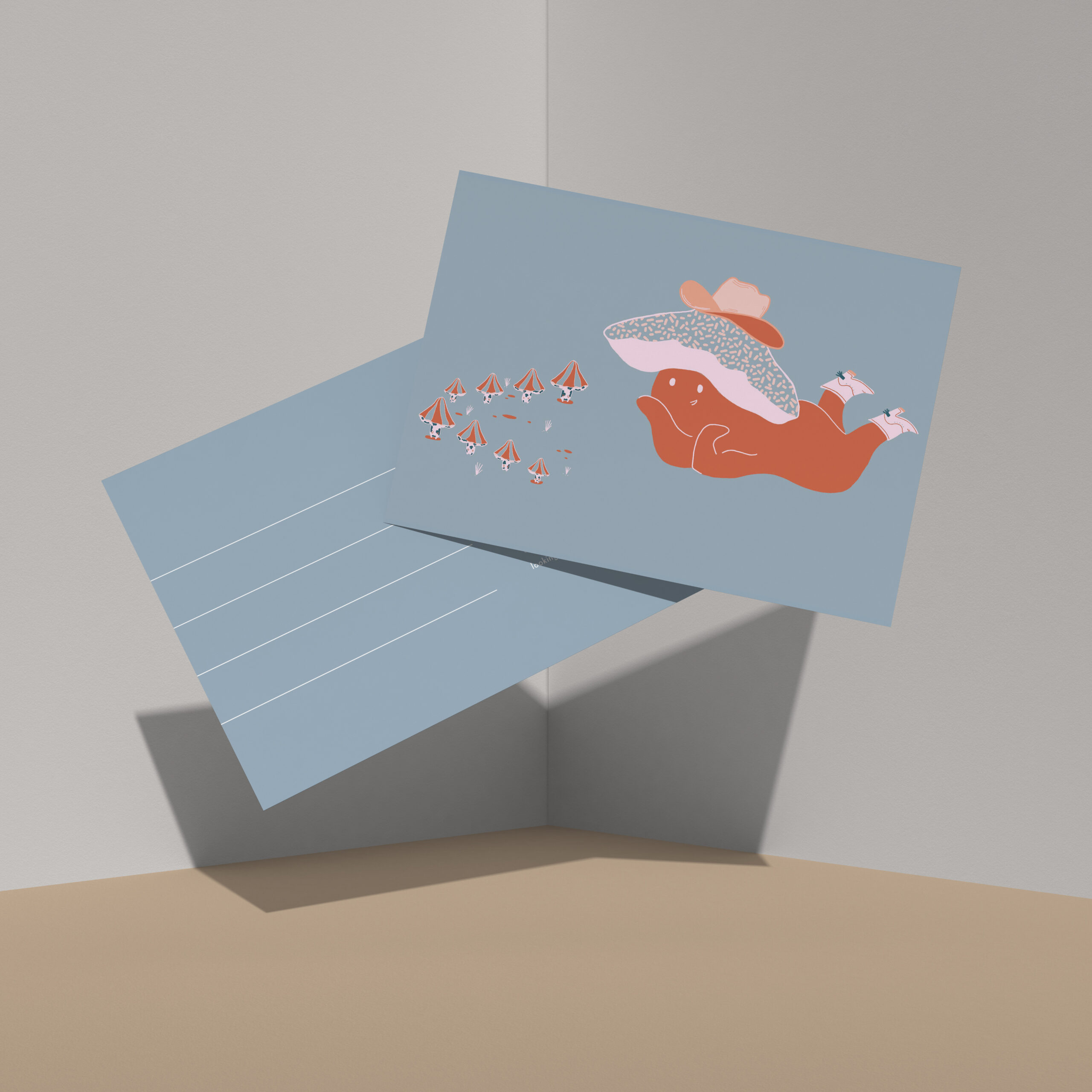 Blue poster with abstract orange shapes leaning on a beige wall, casting a long shadow behind it (decorative artwork).