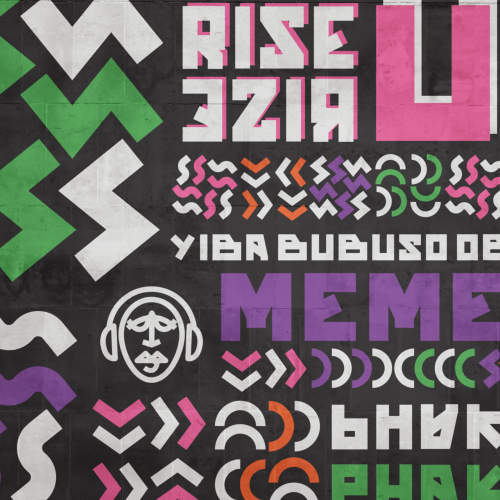 Colorful graffiti mural on a dark brick wall featuring bold block letters and geometric chevrons in pink, purple, green, and white; an urban street-art scene.